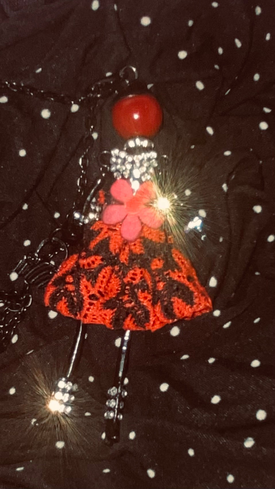 Whimsical doll necklace