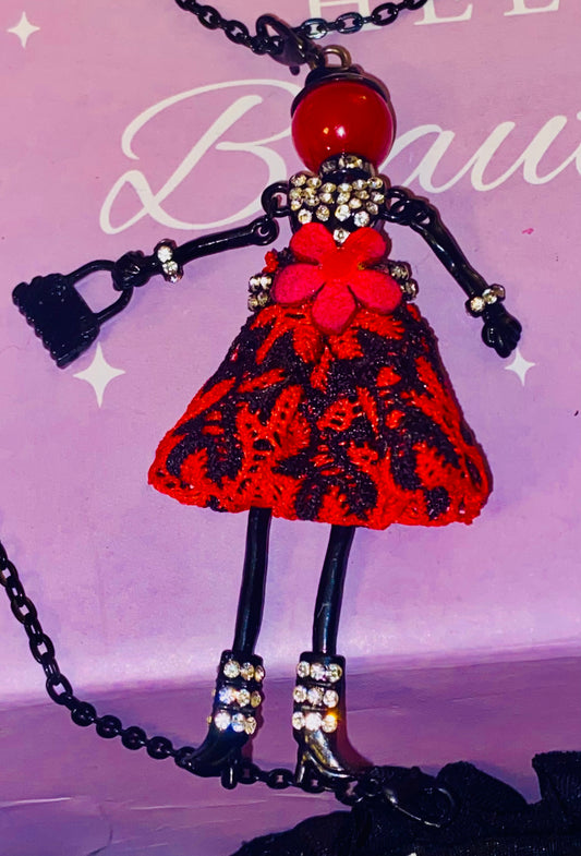 Whimsical doll necklace