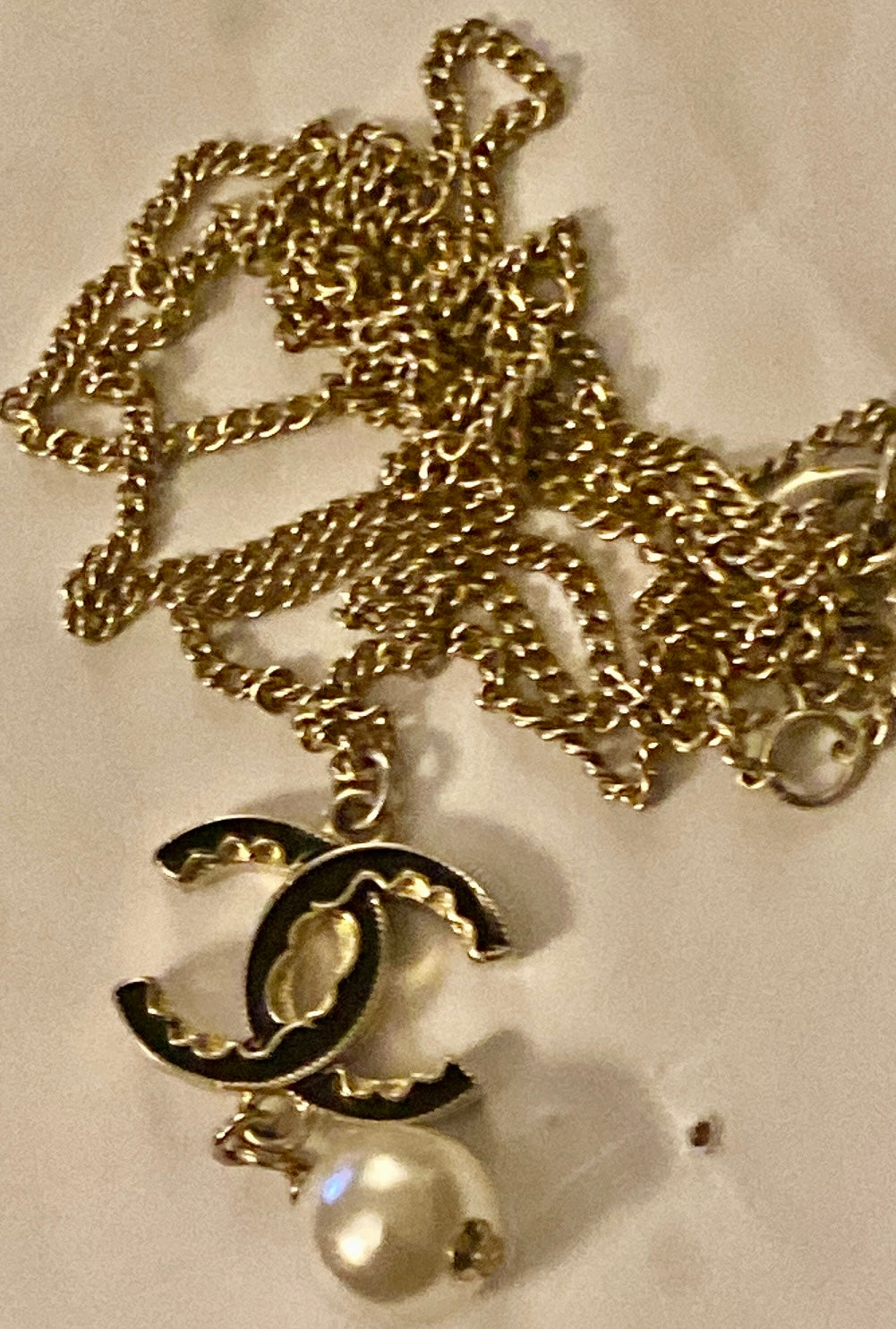 Authentic Chanel Pearl Logo Wave Black & Gold Necklace