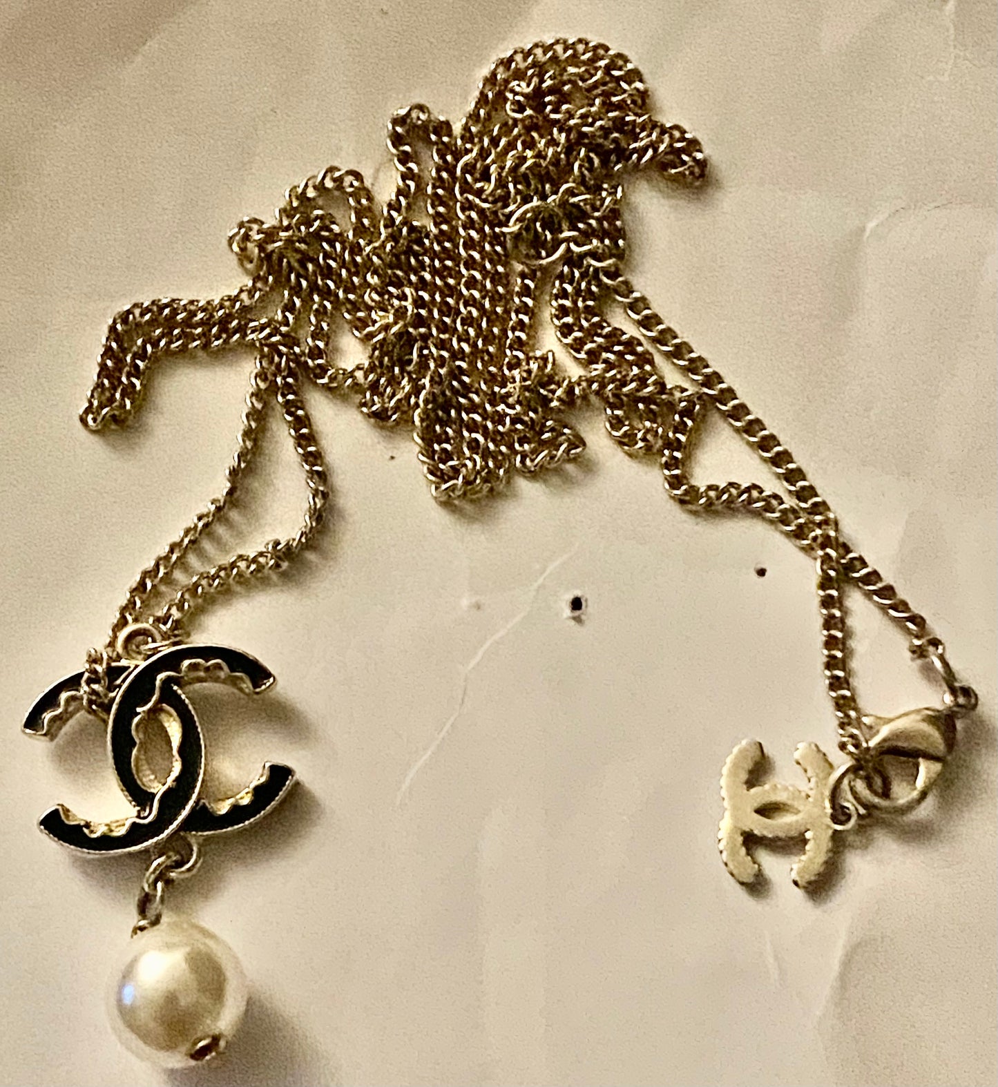 Authentic Chanel Pearl Logo Wave Black & Gold Necklace