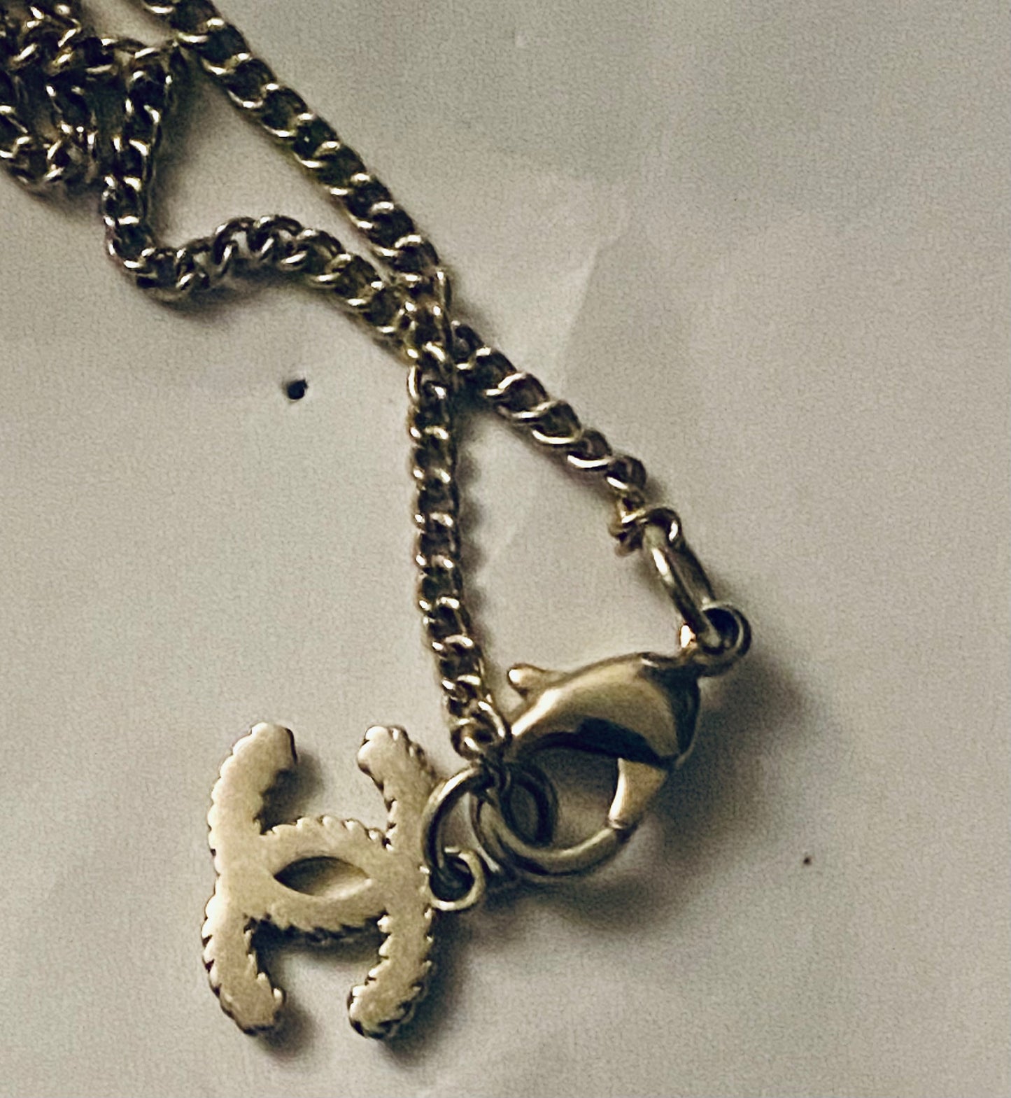 Authentic Chanel Pearl Logo Wave Black & Gold Necklace