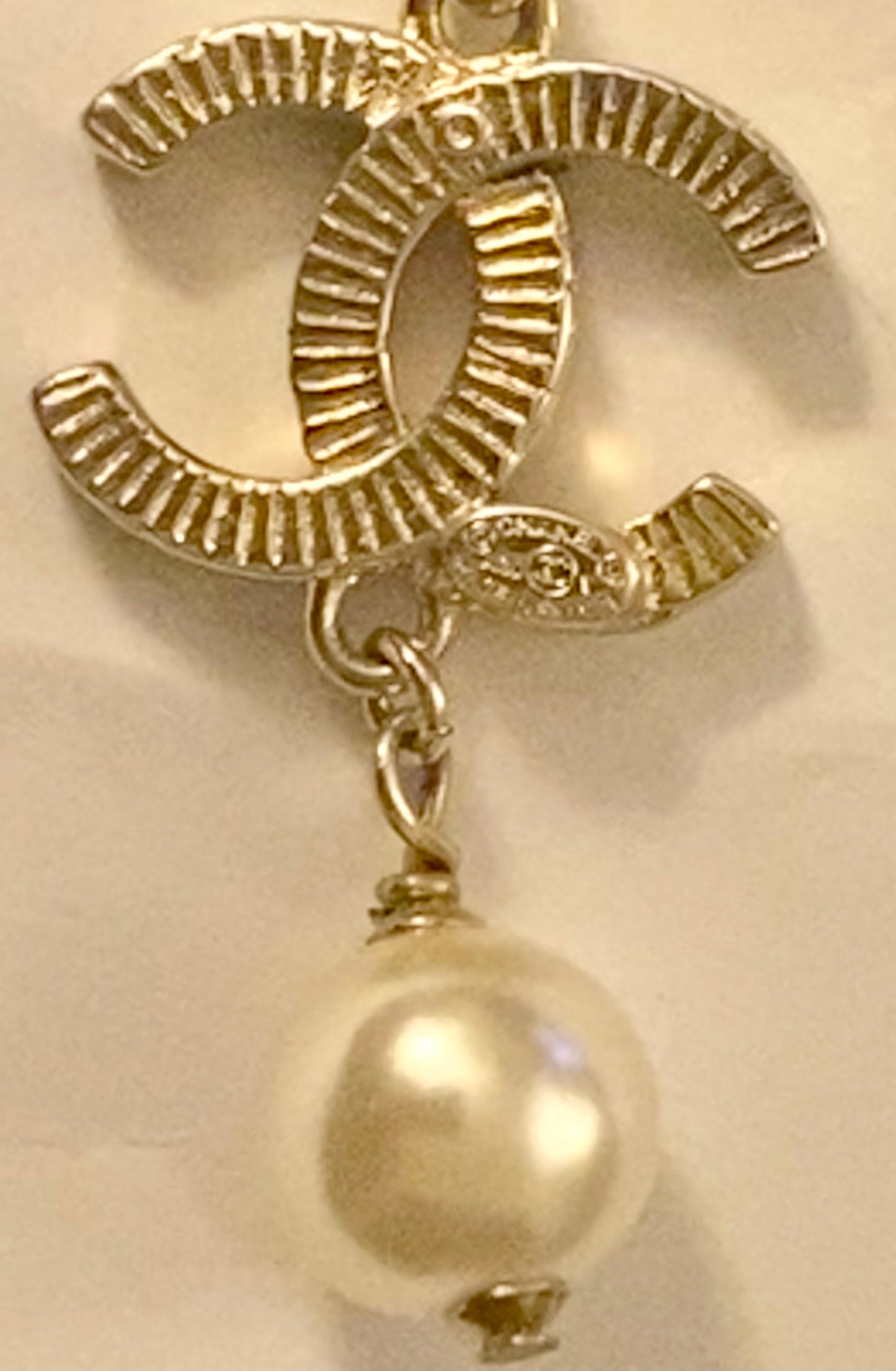 Authentic Chanel Pearl Logo Wave Black & Gold Necklace