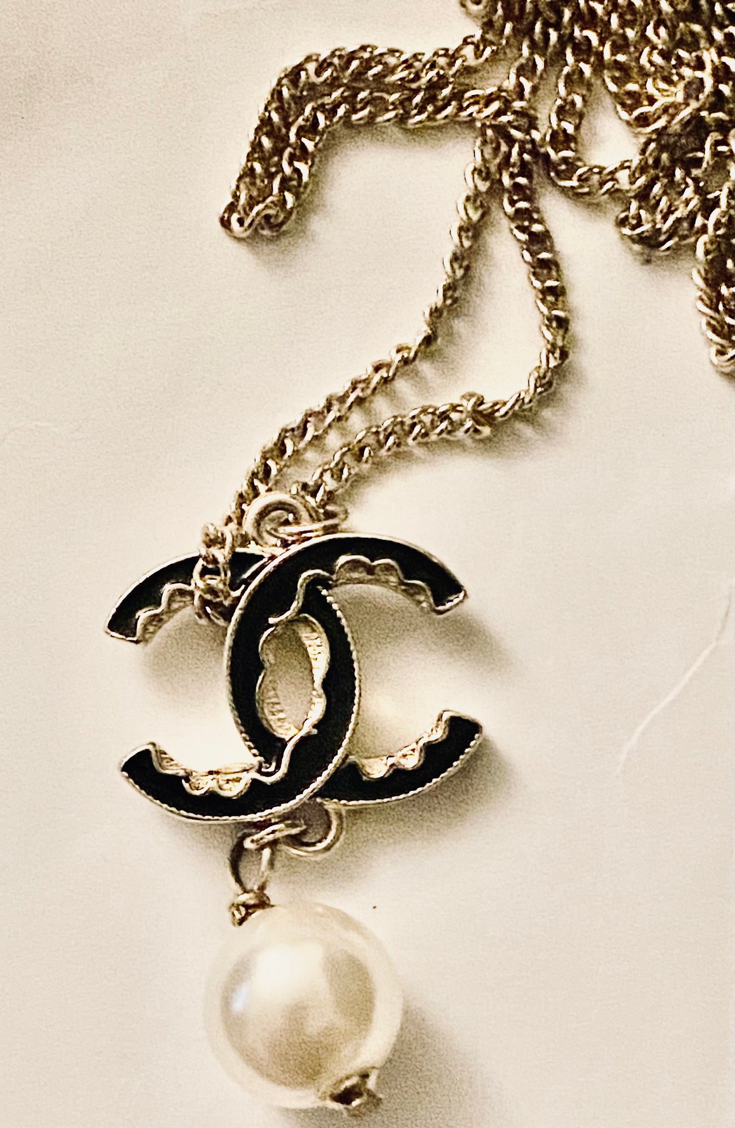 Authentic Chanel Pearl Logo Wave Black & Gold Necklace