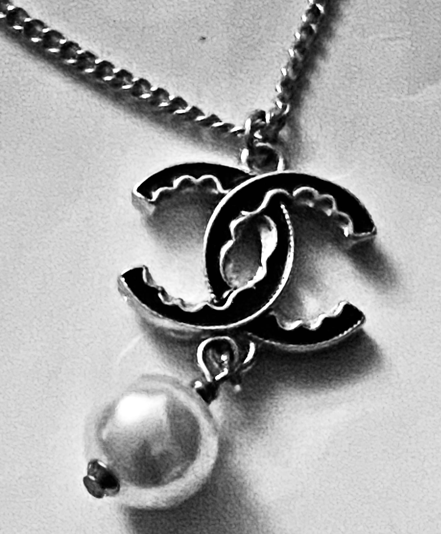 Authentic Chanel Pearl Logo Wave Black & Gold Necklace
