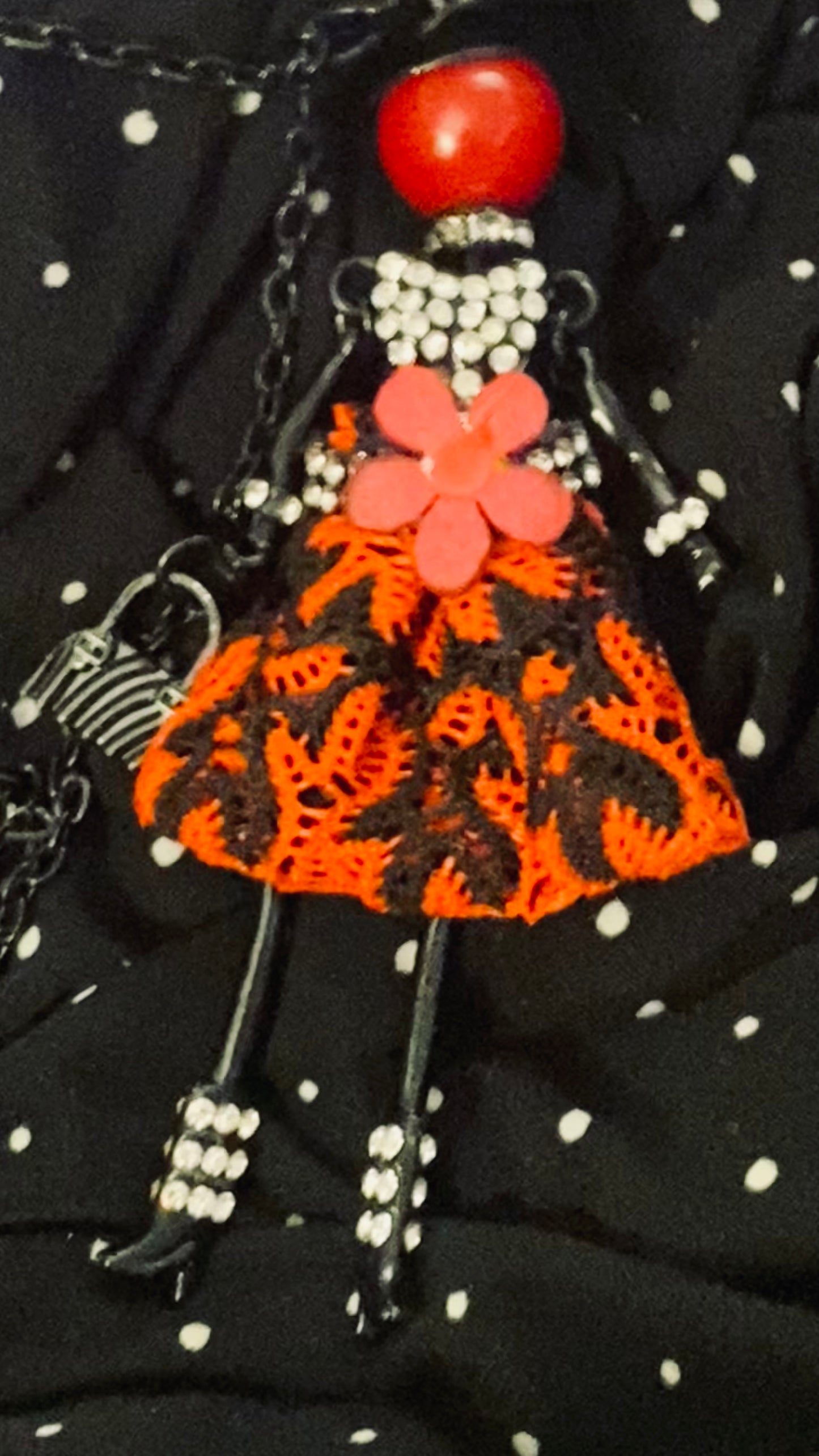 Whimsical doll necklace