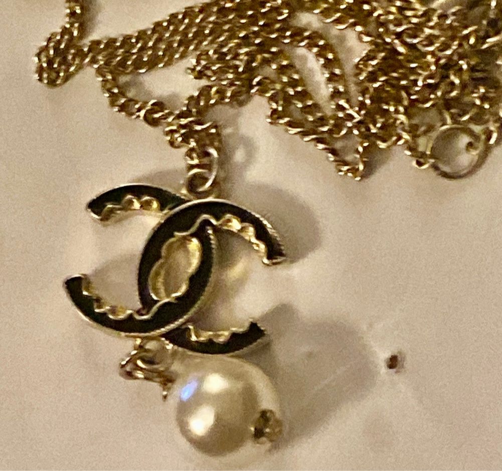 Authentic Chanel Pearl Logo Wave Black & Gold Necklace